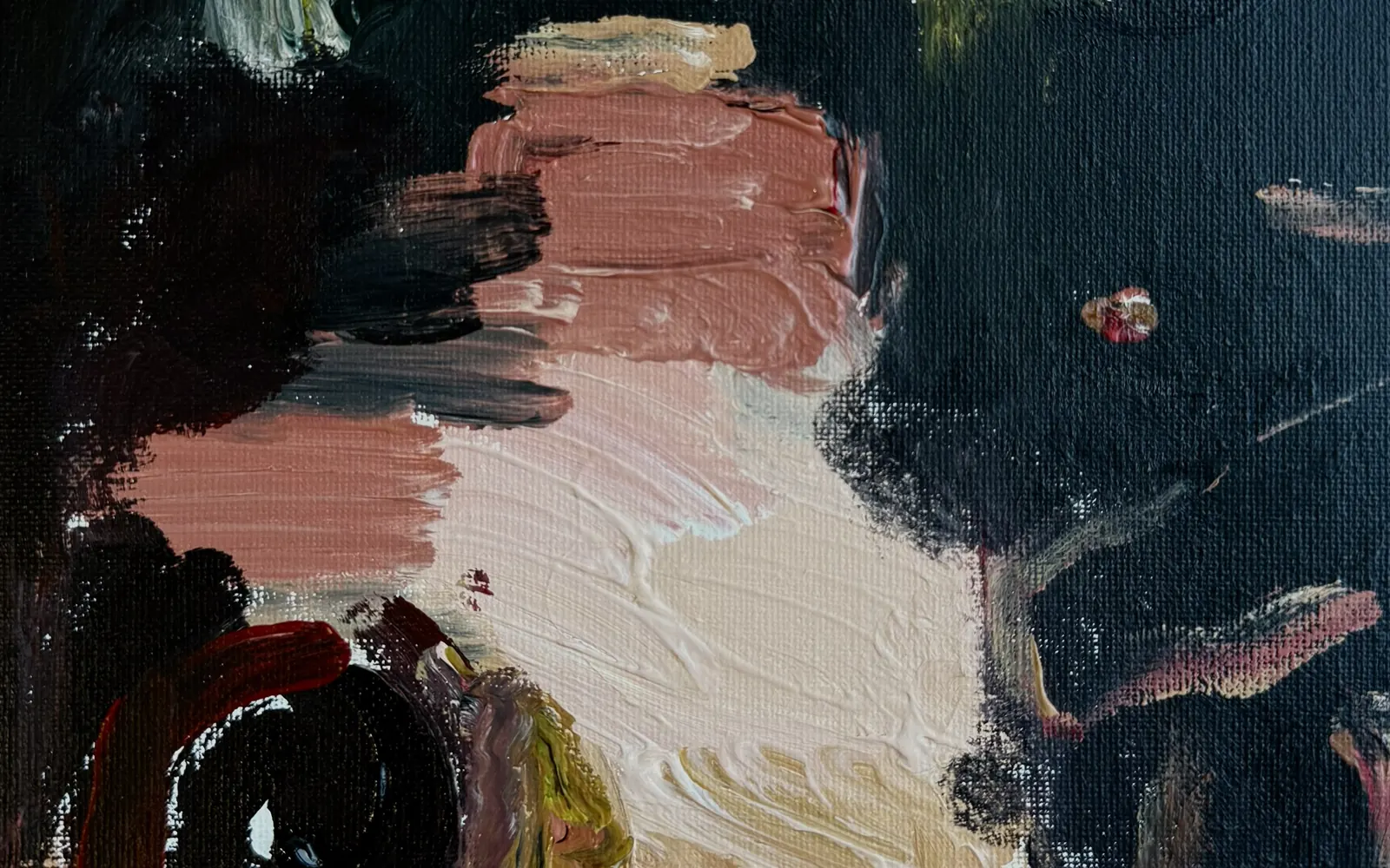 The studio's painting in full: cream, blush and terracotta knife strokes on deep navy, beside a wide, dark eye